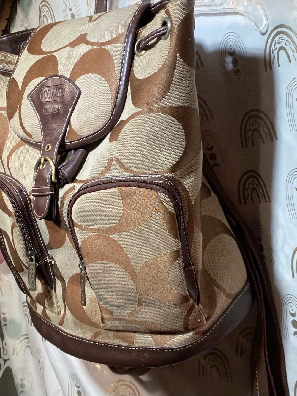 C Brown and Tan Signature Canvas Backpack